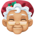 Facebook上的女圣诞老人：中等浅肤色emoji表情
