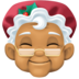 Facebook上的女圣诞老人：中等肤色emoji表情