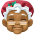 Facebook上的女圣诞老人：中黑肤色emoji表情