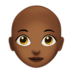 苹果系统里的女性：中黑肤色，秃顶emoji表情
