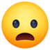 Facebook上的微微张嘴的脸emoji表情
